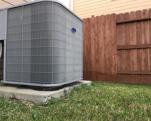 hvac unit in yard near fence ctarpon fl
